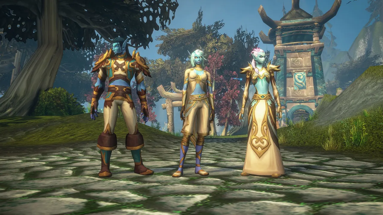 Drei Skyborne-Charaktere in goldenen und petrolfarbenen Outfits auf einer bemoosten Kopfsteinpflasterstraße vor einem Turm mit Pagodendach und einem Wirbelbanner