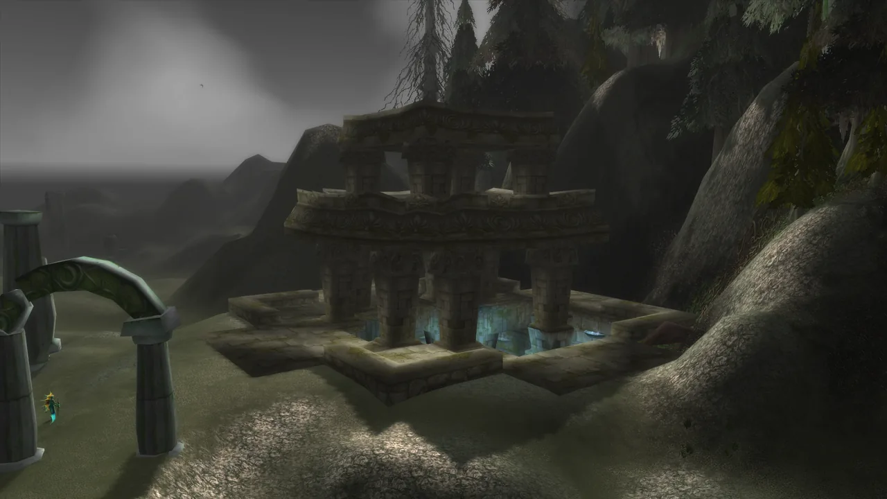 Ruined stone arches surround a water-filled stairwell on the rocky coast outside Blackfathom Deeps